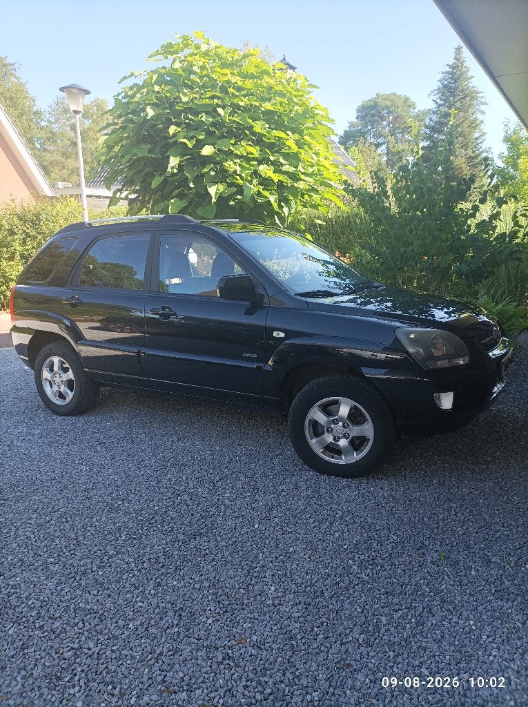 Kia Sportage 2.0 4WD 2007 Zwart, 1578 kg, 4 cilinders, Leder en Stof, Zwart