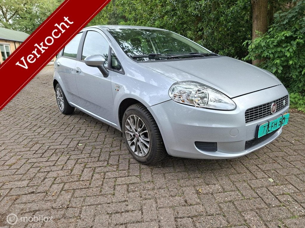 FIAT GRANDE PUNTO 1.4 5 DEURS AIRCO CRUISE CONTROL TREKHAAK, Auto's, Fiat, Voorwielaandrijving, 4 cilinders, 400 kg, Grande Punto
