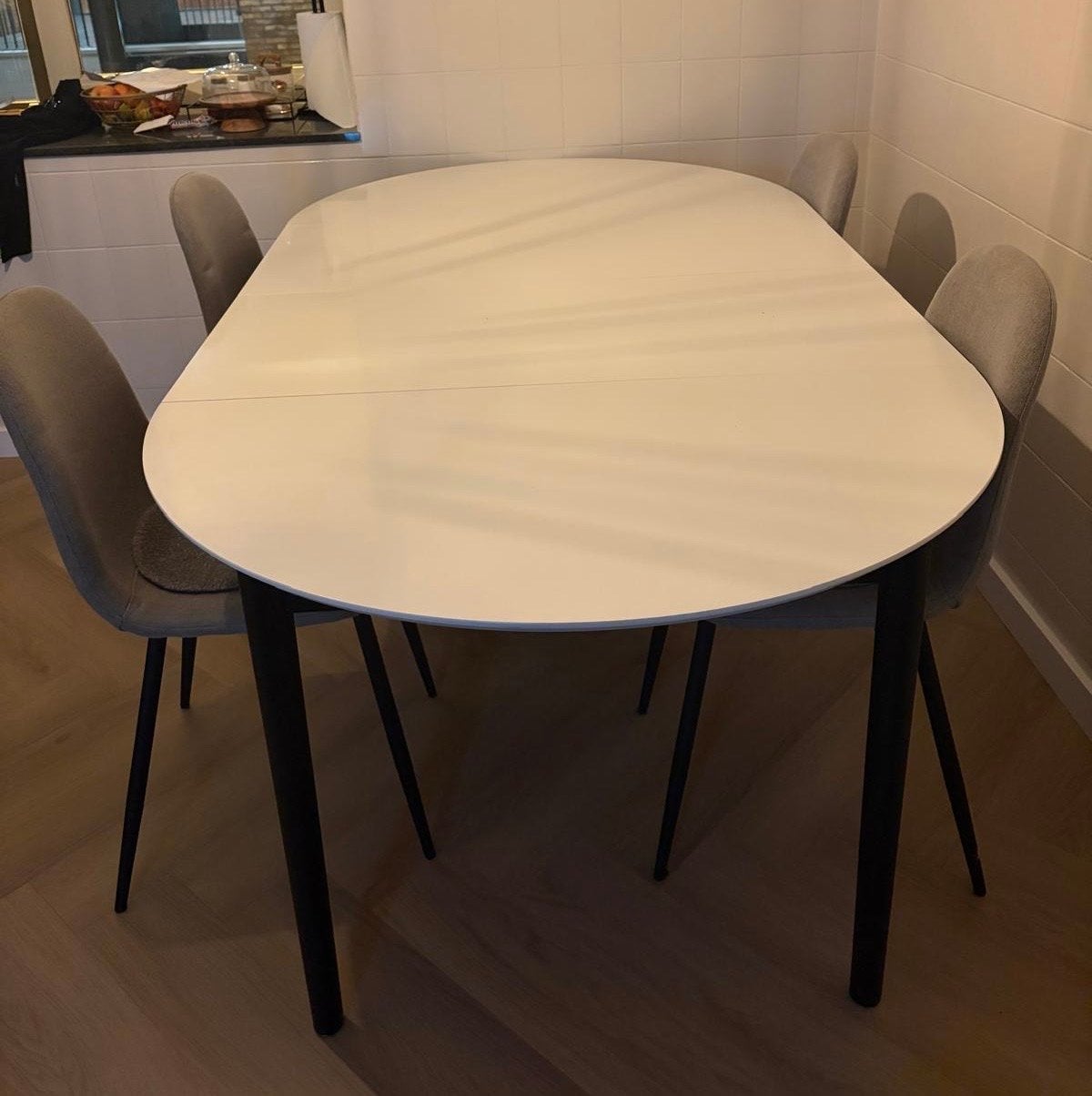 Uitschuifbare ovale eettafel incl 4 stoelen, Ophalen, 50 tot 100 cm, Zo goed als nieuw, 150 tot 200 cm