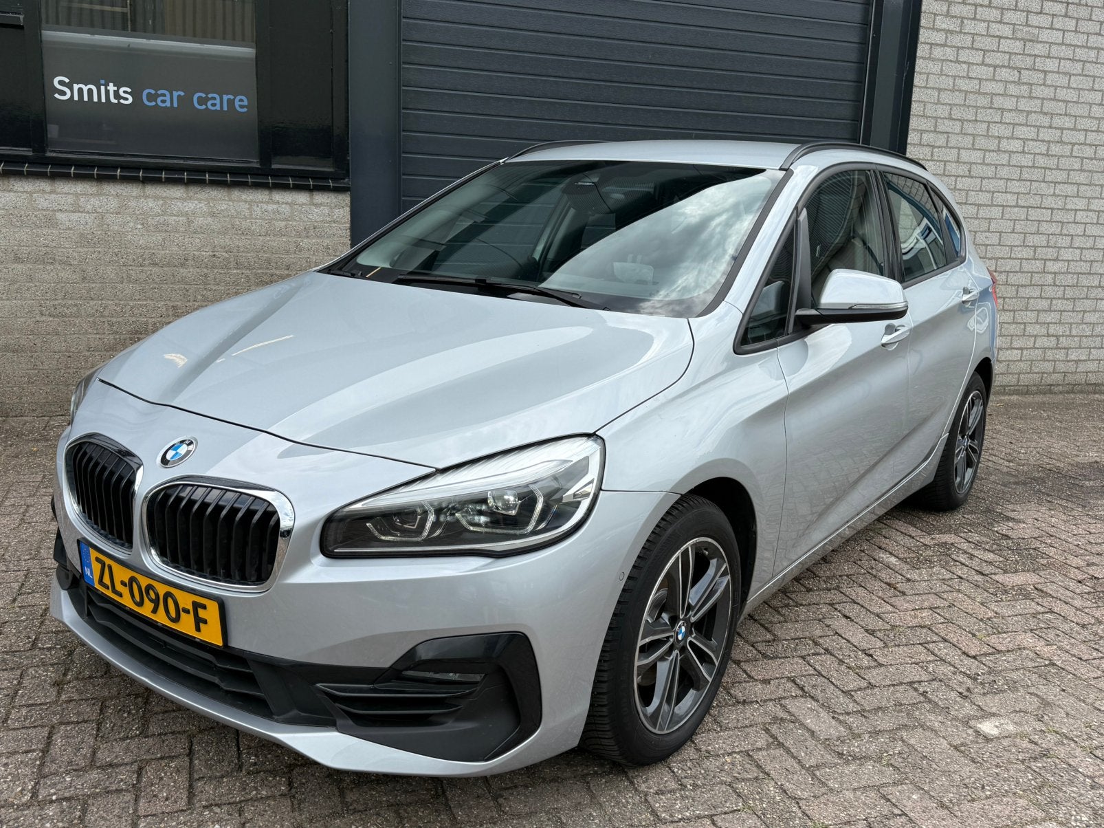 BMW 2-Serie Active Tourer 218i Aut trekhaak 136pk 2019 Grijs, Auto's, BMW, Leder en Stof, Particulier, 3 cilinders, 2-Serie Active Tourer