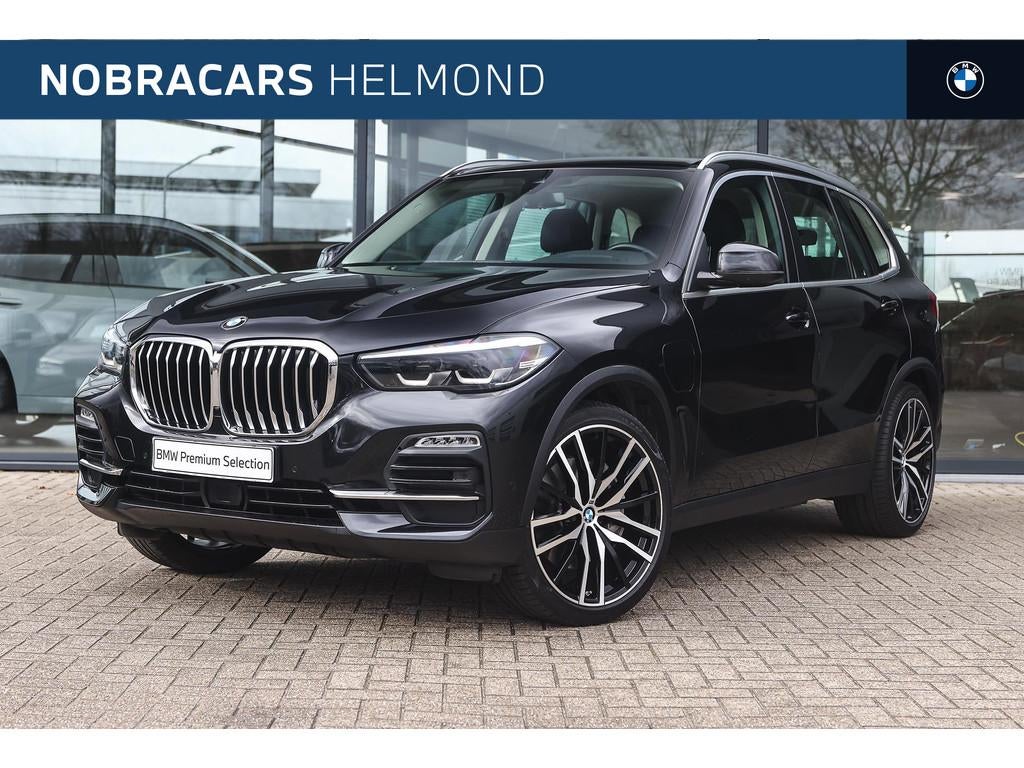 BMW X5 xDrive45e Executive Automaat / Sportstoelen / Achteru, Gebruikt, 394 pk, Zwart, Vierwielaandrijving
