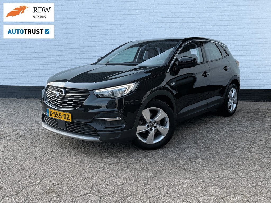 Opel Grandland X 1.2 Turbo Ultimate LEDER l 360C l TREKHAAK!, Auto's, Opel, Voorwielaandrijving, Gebruikt, 1199 cc, Lichtsensor