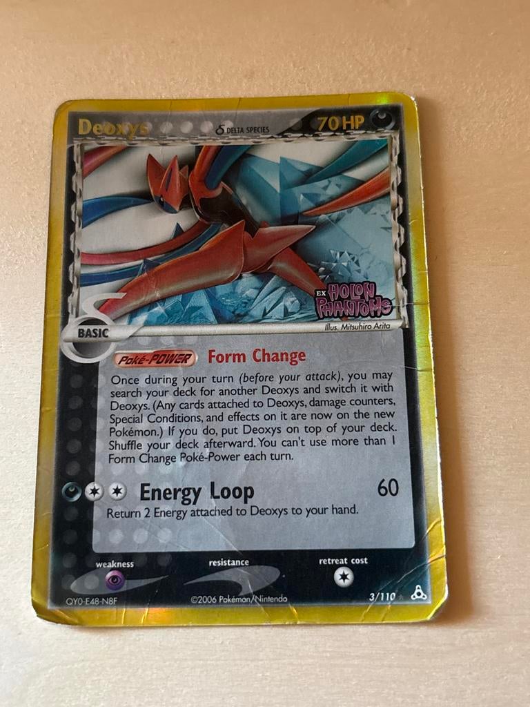 Beschadigde Deoxys Pokémon Kaart - Delta Species 3/110, Ophalen of Verzenden, Zo goed als nieuw, Losse kaart