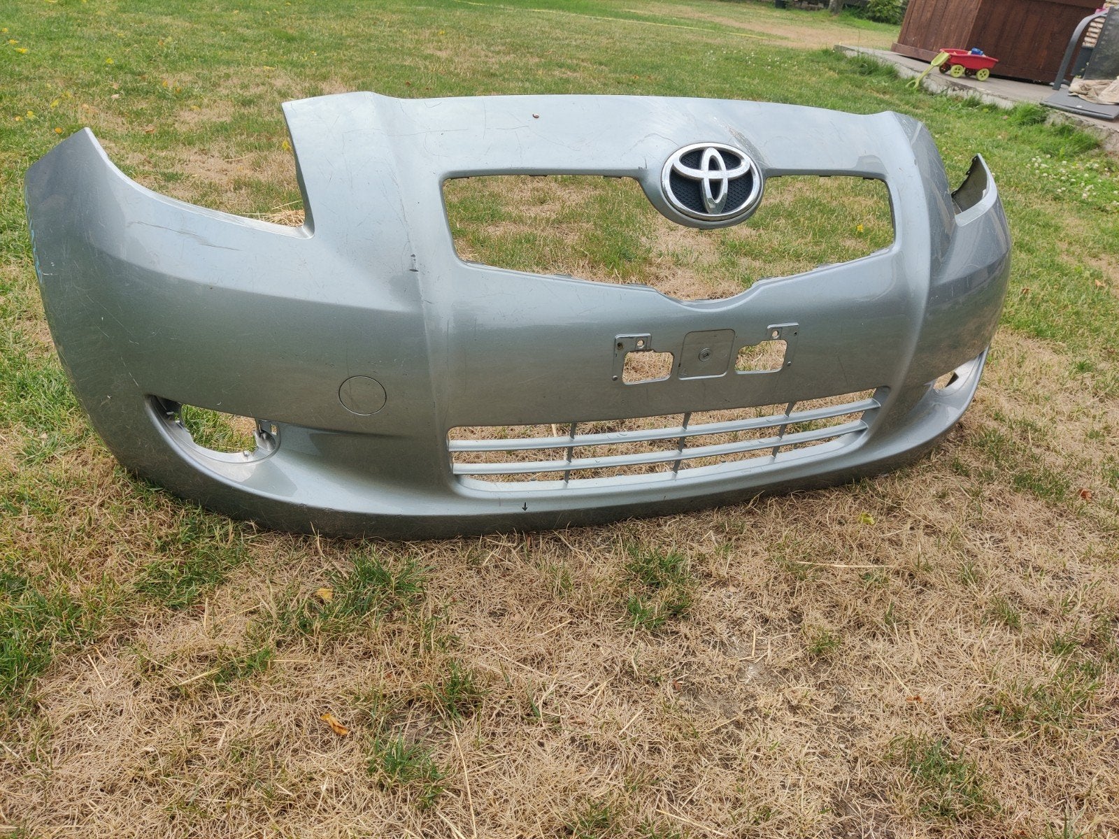 Gebruikte Voorbumper Toyota Yaris (2006-2011) Grijs, Gebruikt, Voor, Ophalen of Verzenden, Toyota
