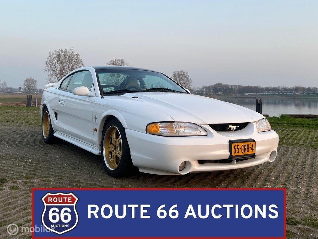 Ford Mustang SN95 Coupe | 1996 | Route 66 Auctions, Overige carrosserieën, Zwart, Bedrijf, Handgeschakeld