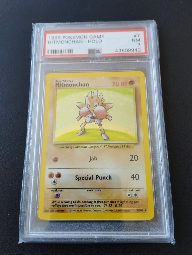 Hitmonchan Holo Pokemon kaart Base set PSA7 NM WOTC, Ophalen of Verzenden, Zo goed als nieuw