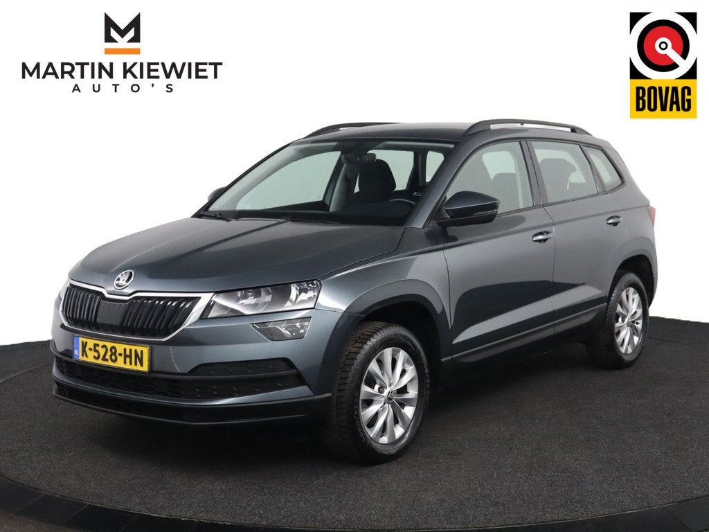Skoda Karoq 1.0 TSI Business Edition|Trekhaak|PDC|Navigatie, Auto's, Skoda, Voorwielaandrijving, Stof, Gebruikt, Automatische klimaatregeling