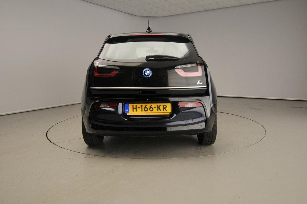 BMW i3 Executive Edition 120Ah 42 kWh LED | Navigatie | Stoe, Auto's, BMW, Automaat, 12 maanden, Gebruikt, Grijs
