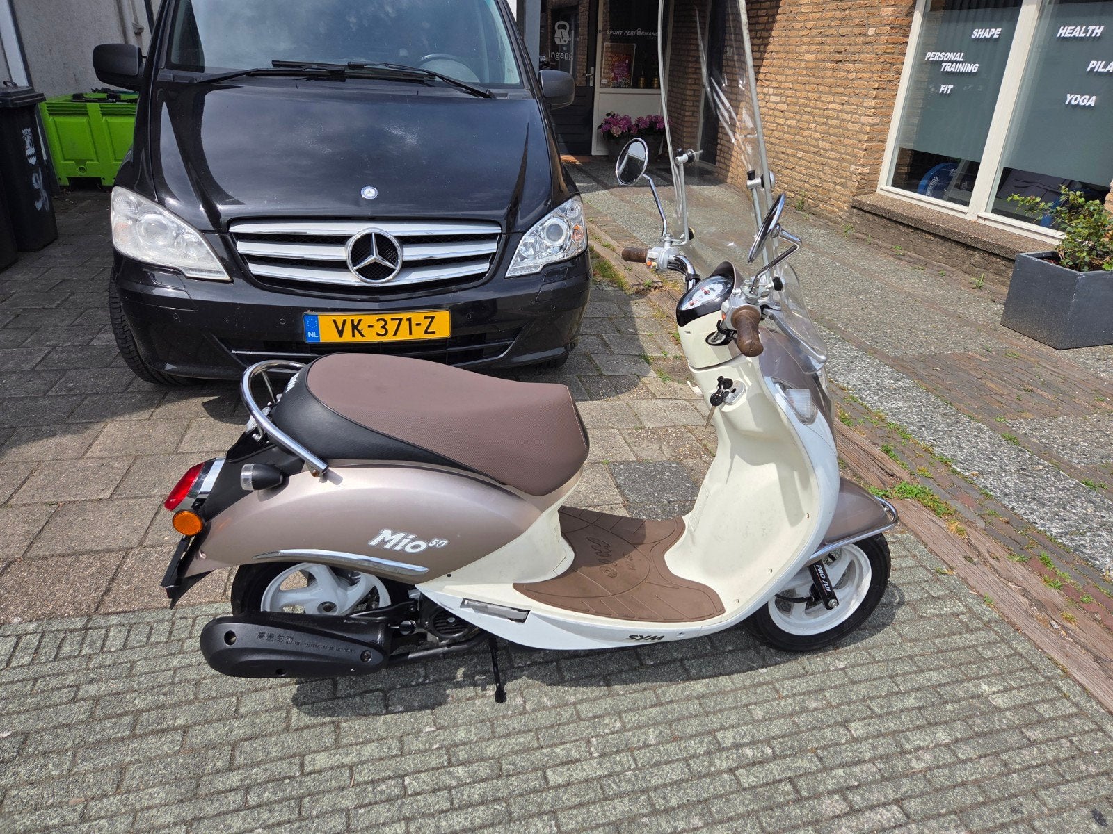 Zeer nette gebuikte Sym Mio 25 km, Ophalen of Verzenden, Zo goed als nieuw, Benzine, Mio