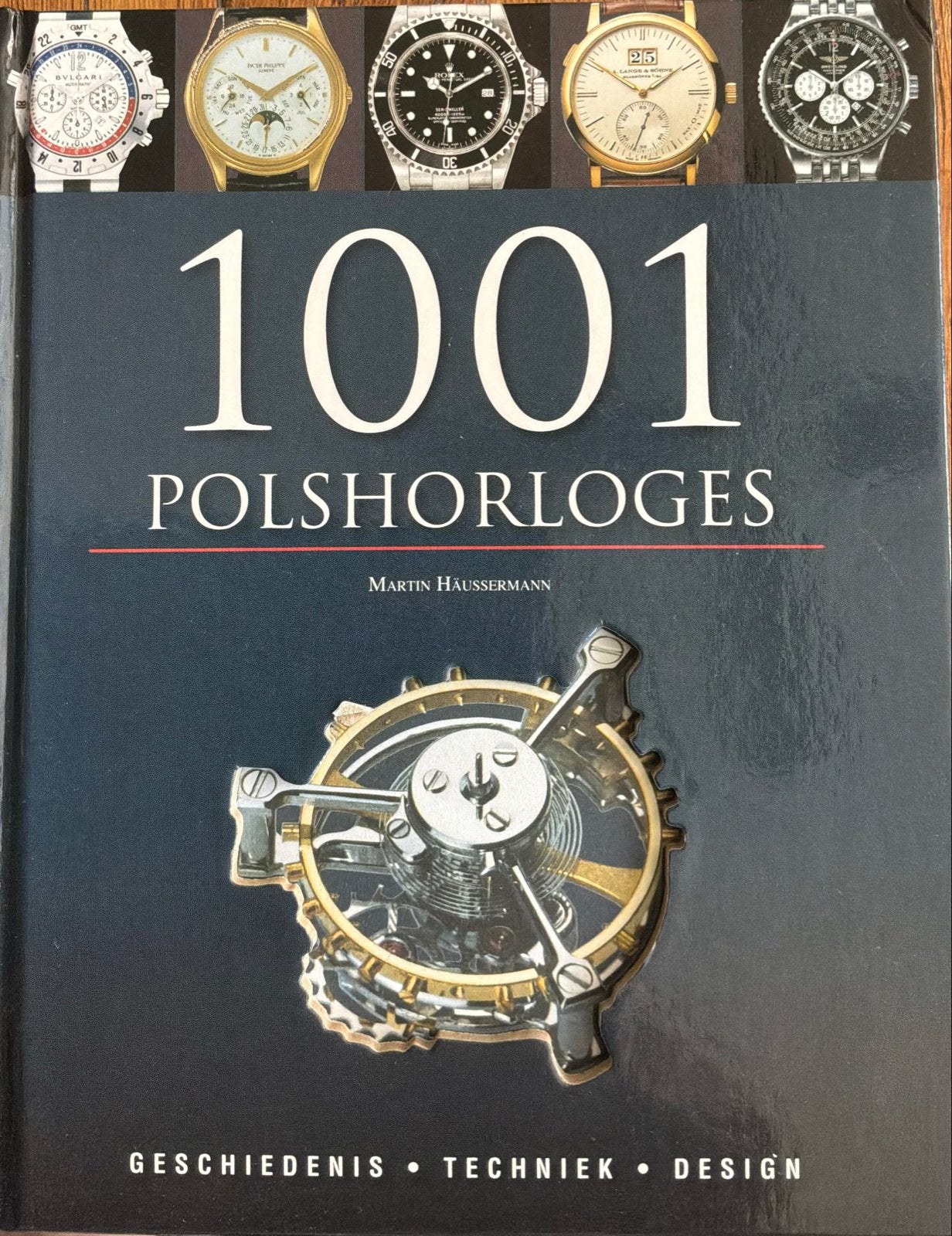 1001 Polshorloges - Geschiedenis, Techniek, Design, Boeken, Ophalen of Verzenden, 20e eeuw of later, Zo goed als nieuw