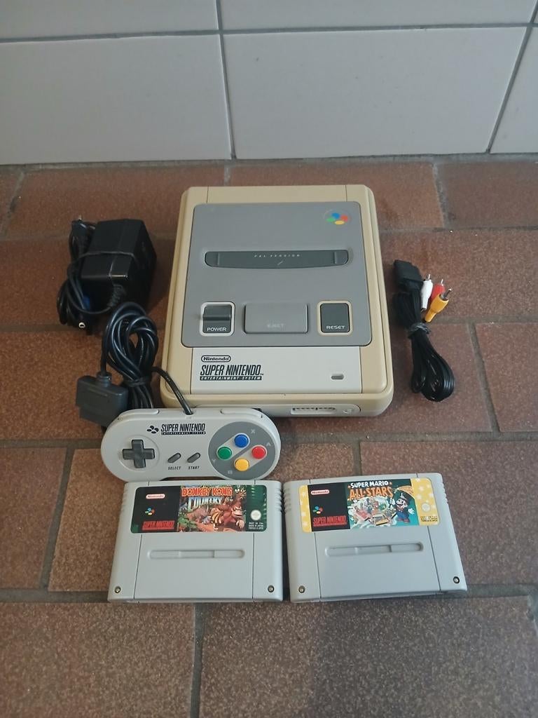Super Nintendo Console met 1 controller en 2 spellen, Spelcomputers en Games, Games | Nintendo Super NES, Gebruikt, Avontuur en Actie