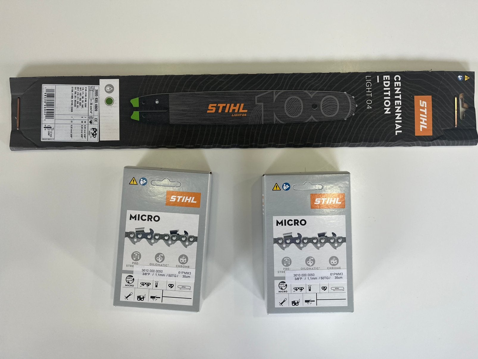 Stihl zaagblad 35cm 100j editie + 2 kettingen, 70 mm of meer, Kettingzaag, Nieuw, Ophalen of Verzenden