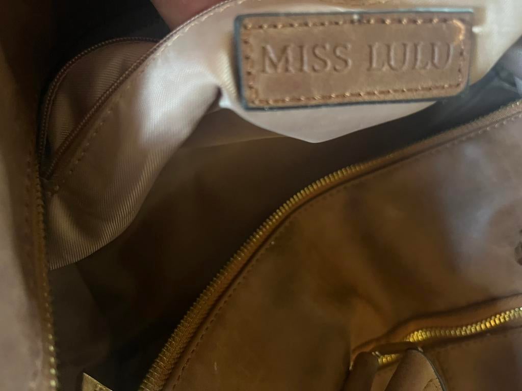 Bruine Luiertas miss Lulu, Ophalen, Gebruikt