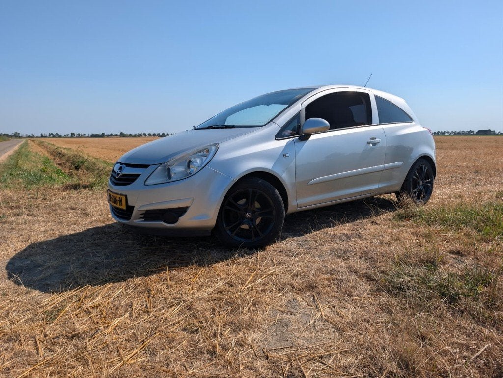 Opel Corsa 1.2 16V 3D WR 2007 Grijs, Voorwielaandrijving, Euro 5, Stof, 40 €/maand