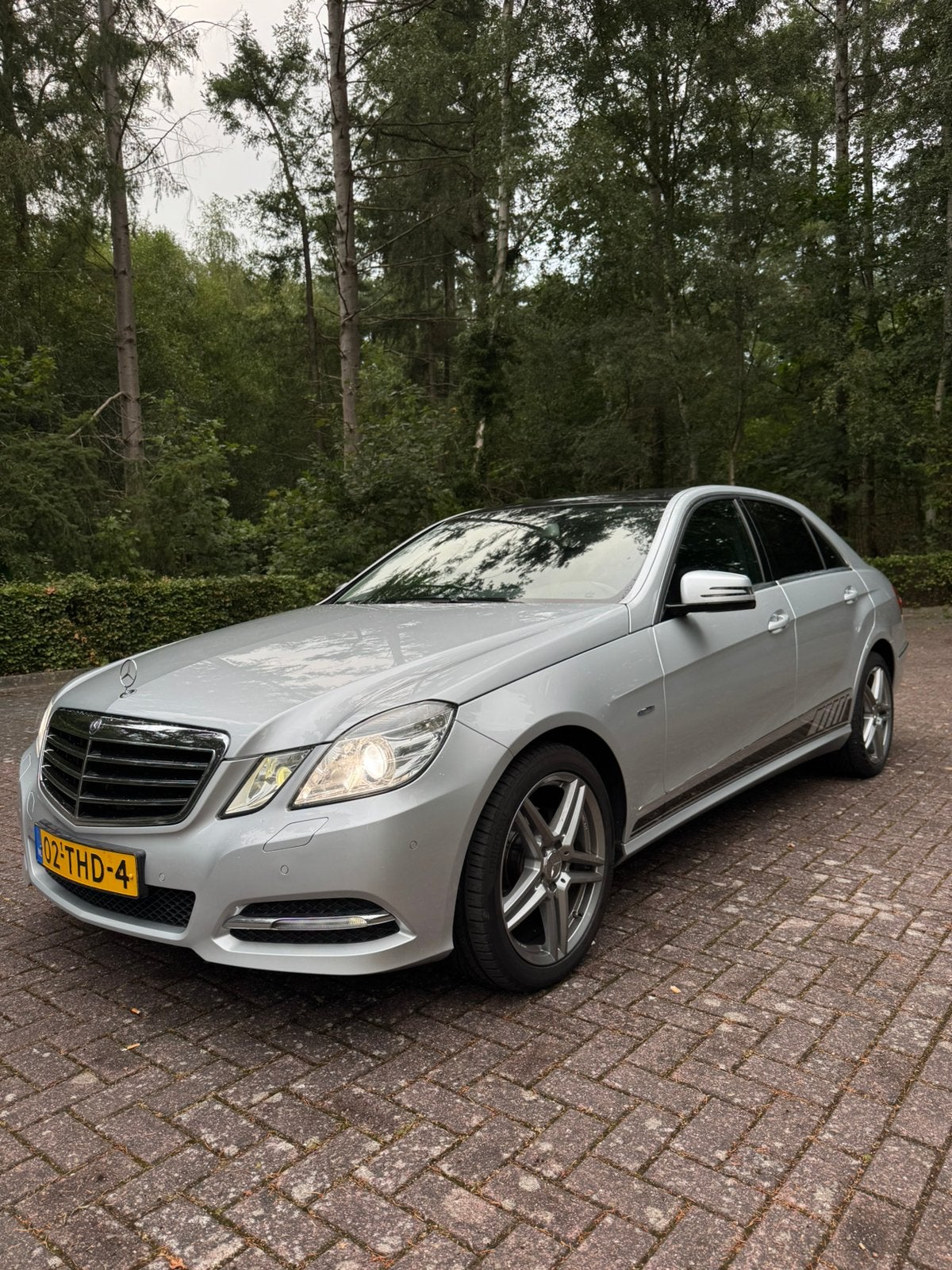 Mercedes-Benz E-Klasse E200 CGI BE Aut7 2012 Grijs, Auto's, 4 cilinders, 1796 cc, Origineel Nederlands, Particulier