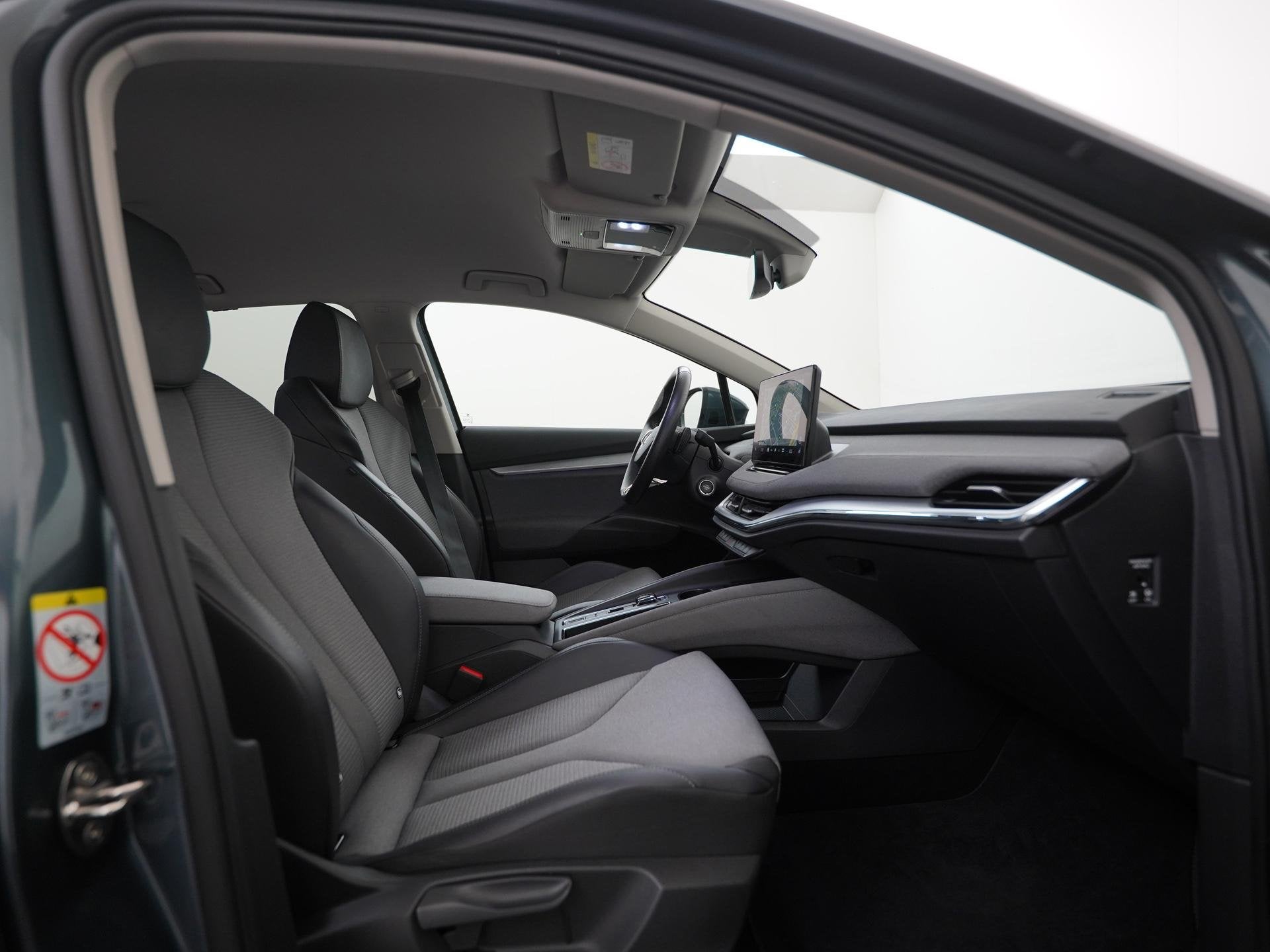 Skoda Enyaq iV 60 | SOH 93% | Trekhaak | Warmtepomp | Memory, Auto's, Automaat, Gebruikt, 179 pk, Leder en Stof