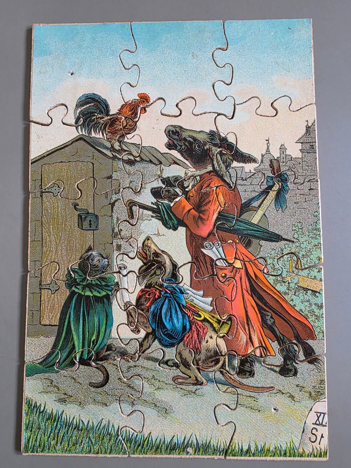 134) KISTJE MET ANTIEKE PUZZLES, Verzenden