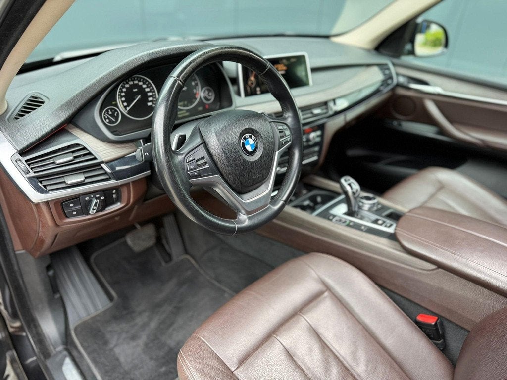 BMW X5 xDrive50i22 inch / pano / memory / camera, Auto's, BMW, Stof, Gebruikt, Zwart, 10 km/l