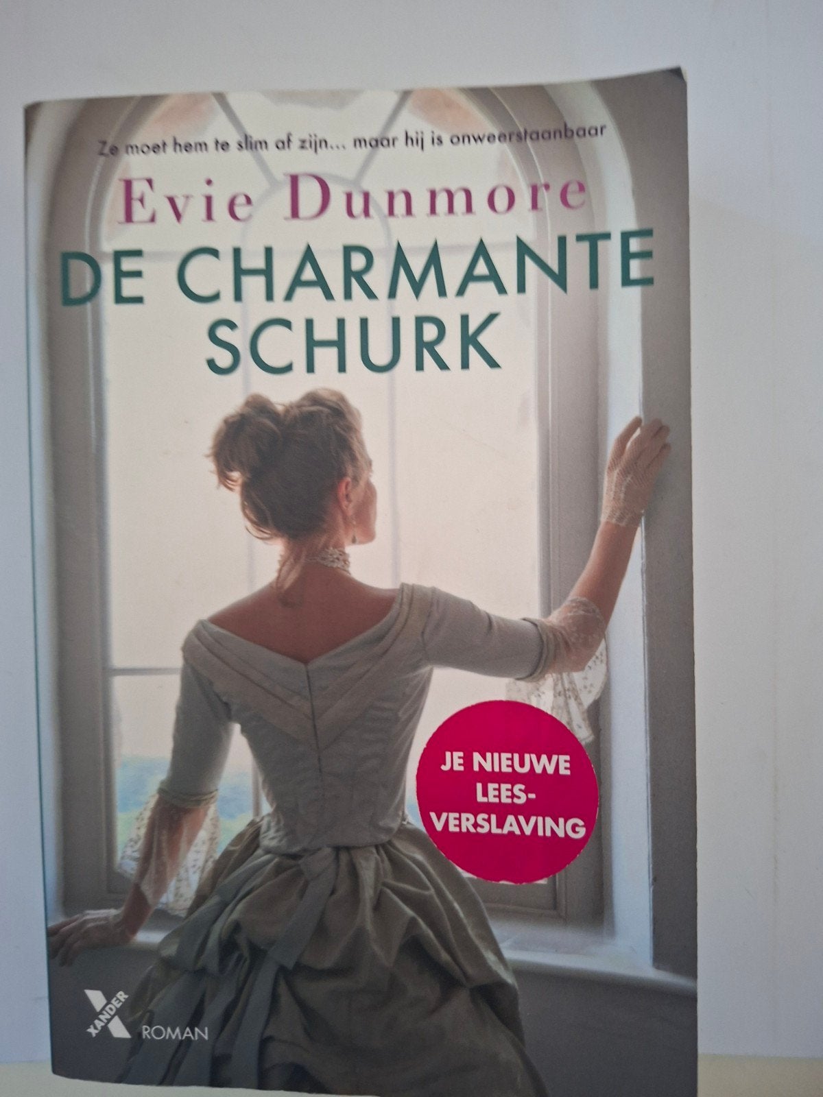 Evie Dunmore - De charmante schurk, Boeken, Verzenden, Zo goed als nieuw, Evie Dunmore