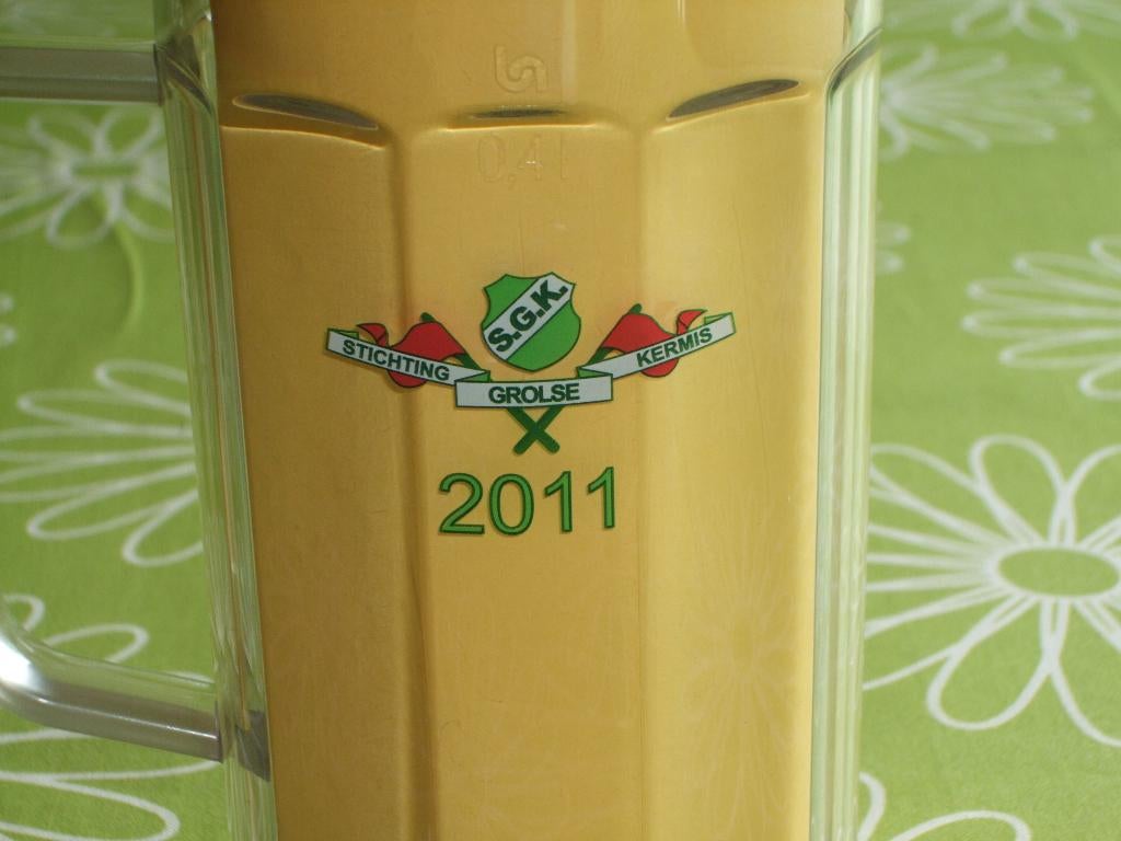 Grolsch Stichting Grolse kermis 2011 kunststof bierpul S.G.K, Ophalen of Verzenden, Zo goed als nieuw, Pul(len), Grolsch