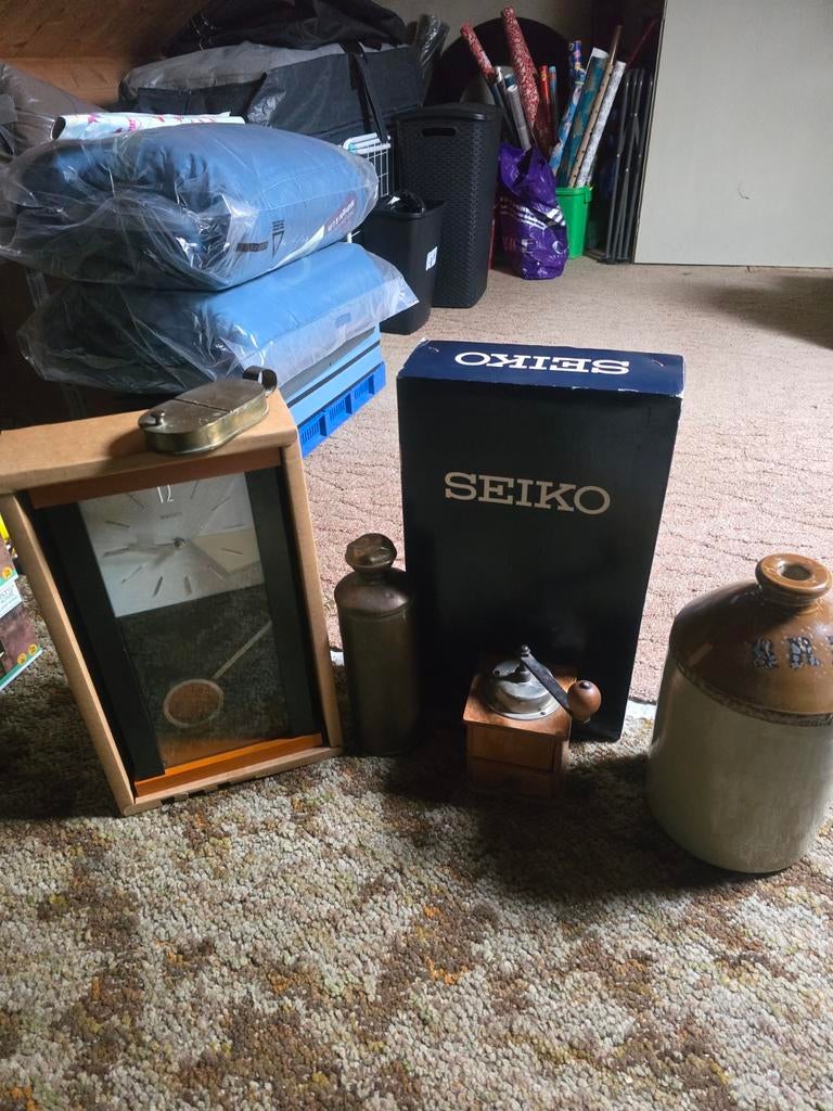 Seiko klok met slinger en messing voorwerp, Antiek en Kunst, Ophalen of Verzenden