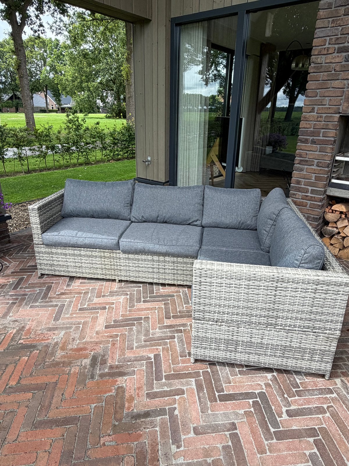 Beschikbaar! Rotan - Wicker lounge Hoek + Kussens - Grijs, Ophalen, 4 zitplaatsen, Gebruikt, Loungeset