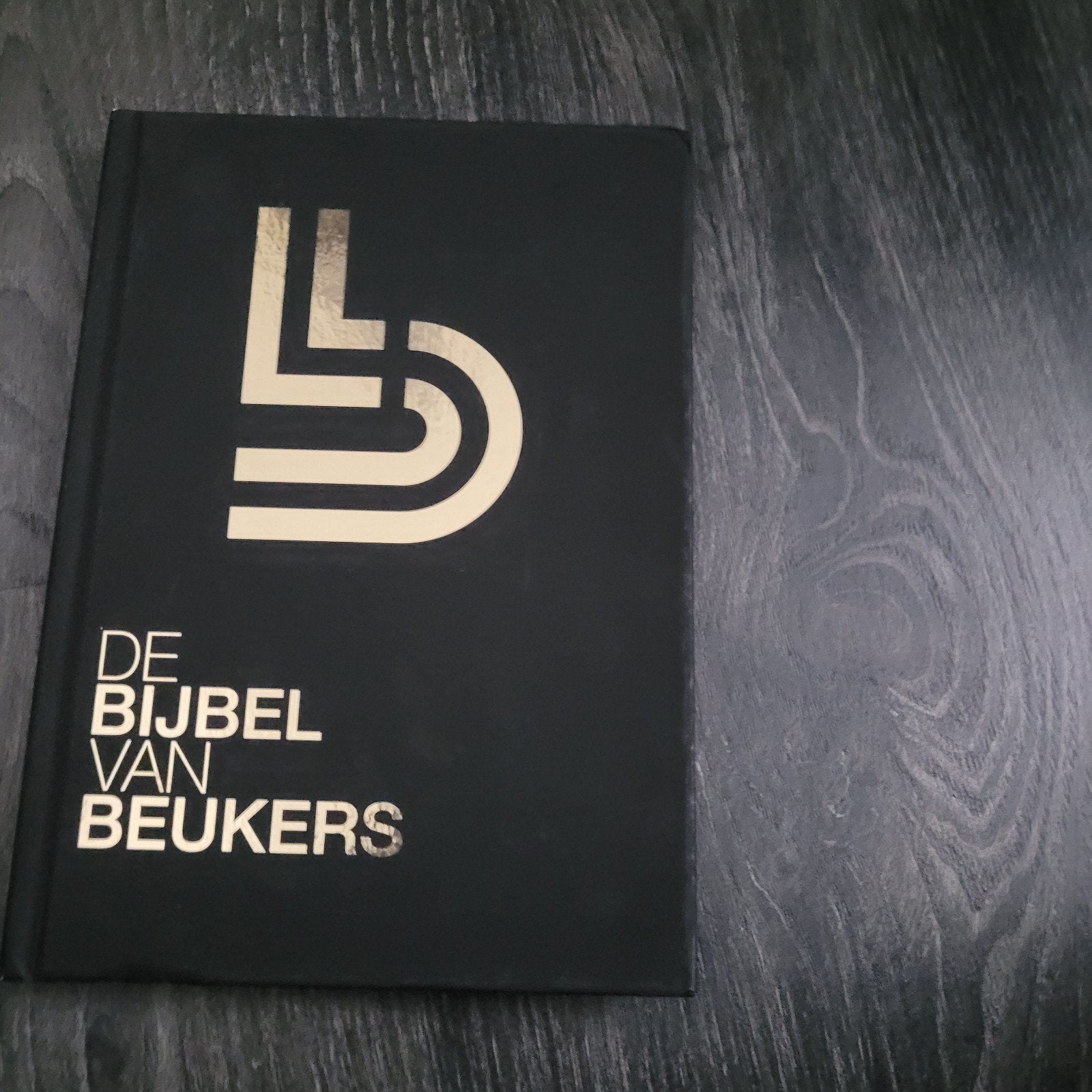 De Bijbel van Beukers - Zwart met Goud, Antiek en Kunst, Antiek | Boeken en Bijbels, Ophalen of Verzenden