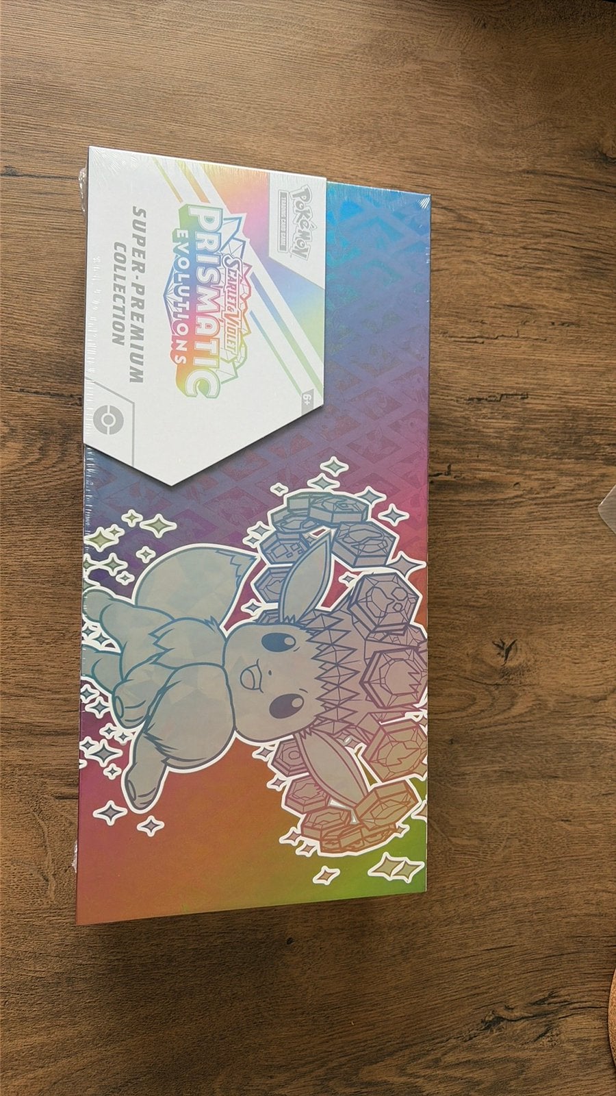 Pokemon prismatic evolutions super premium collection, Hobby en Vrije tijd, Ophalen of Verzenden, Nieuw, Boosterbox