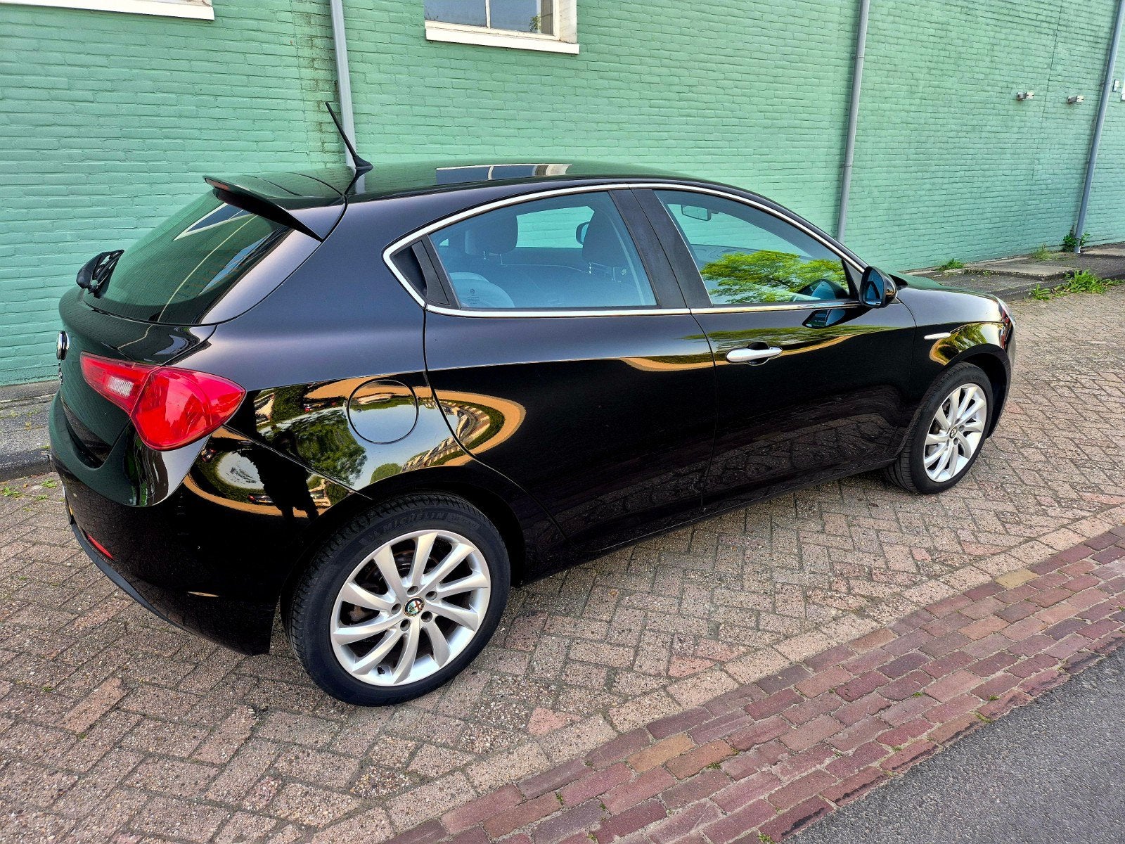 Alfa Romeo Giulietta 1.4 Turbo  2010 Zwart nap airco cruise, Auto's, Voorwielaandrijving, Stof, Zwart, 4 cilinders