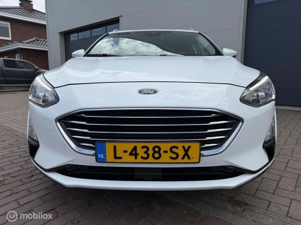 Ford Focus Wagon 1.0 EcoBoost Titanium X Business, Auto's, Ford, 1328 kg, 125 pk, Gebruikt, Euro 6