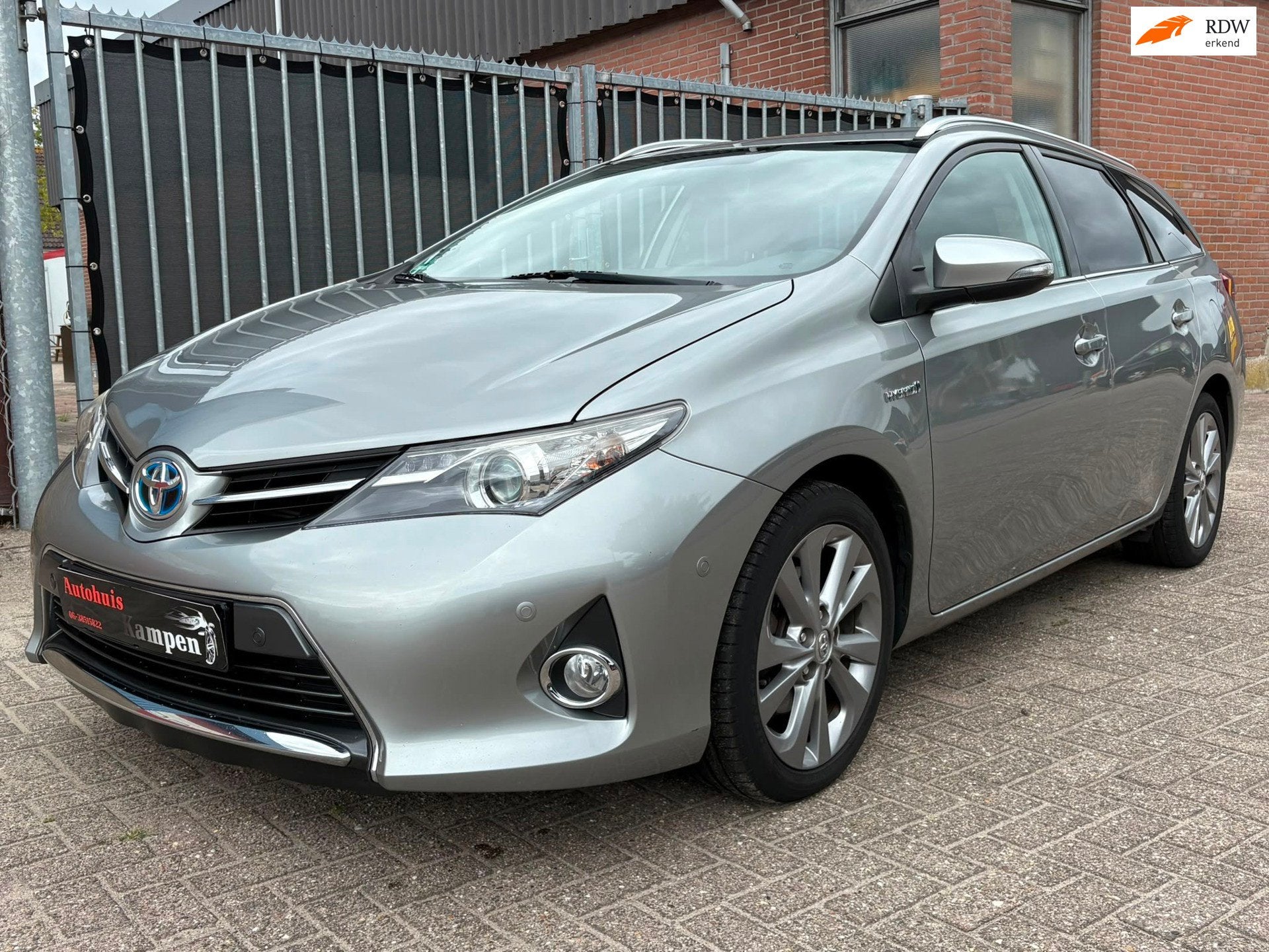Toyota Auris Touring Sports 1.8 Hybrid Dynamic, Stof, Gebruikt, Zwart, 4 cilinders