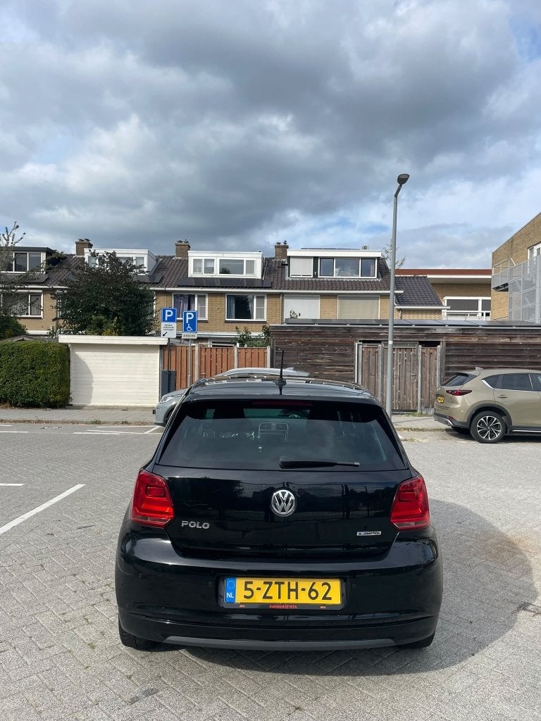 Volkswagen Polo 1.4 TDI 55KW BMT 2015 Zwart, Auto's, Voorwielaandrijving, Stof, 74 pk, 580 kg