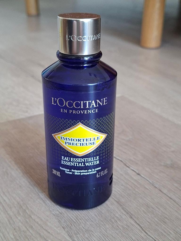 L''OCCITANE Immortelle Essential Water ( 200 ml ), Ophalen of Verzenden, Nieuw, Gehele gezicht, Verzorging