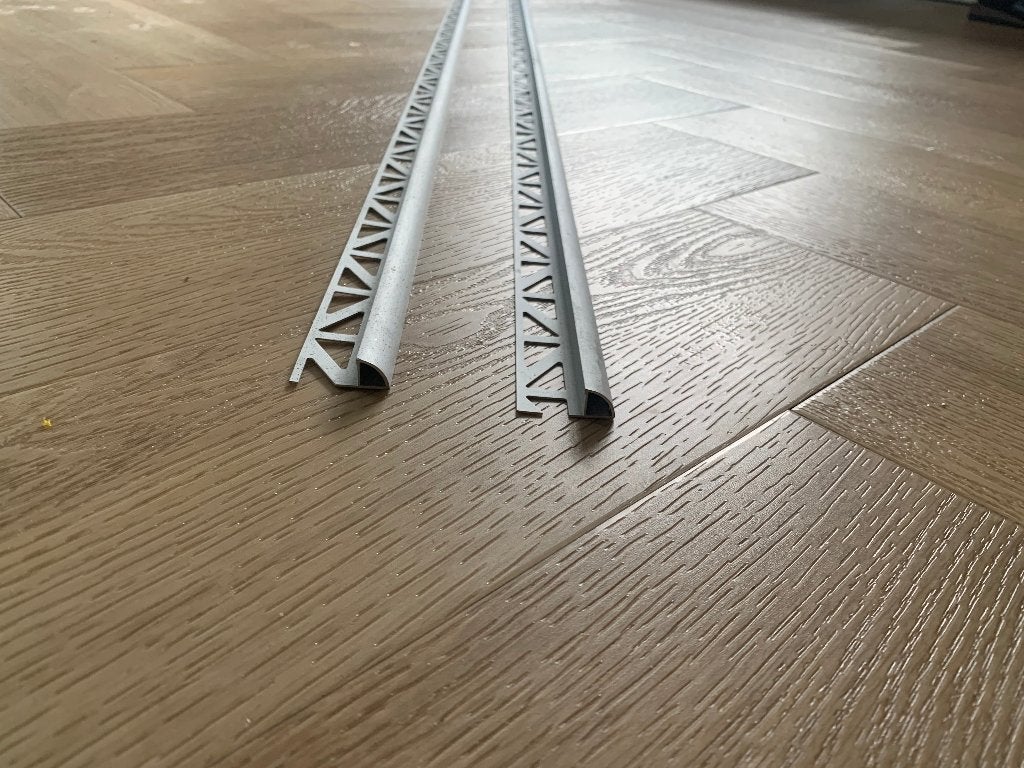 Dural hoekprofielen 2 restanten 4.6 m kwartrond aluminium, Overige materialen, Overige typen, Nieuw, Ophalen of Verzenden