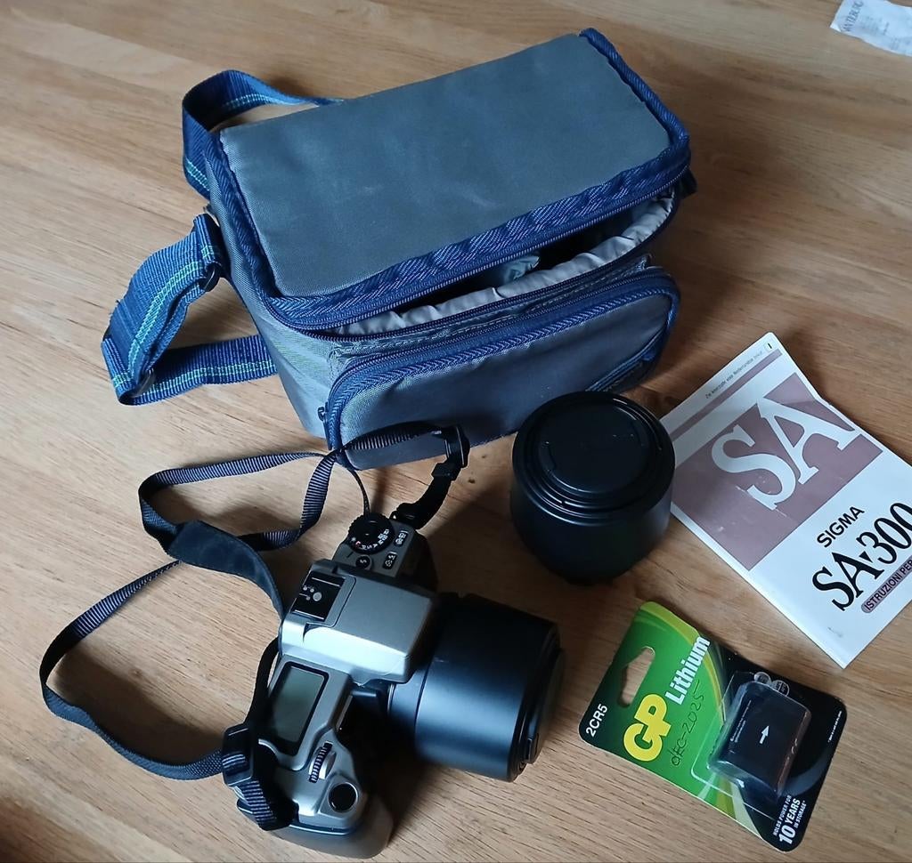 Sigma SA300 Spiegelreflexcamera met tas en accessoires, Ophalen of Verzenden, Gebruikt, Spiegelreflex, Overige Merken
