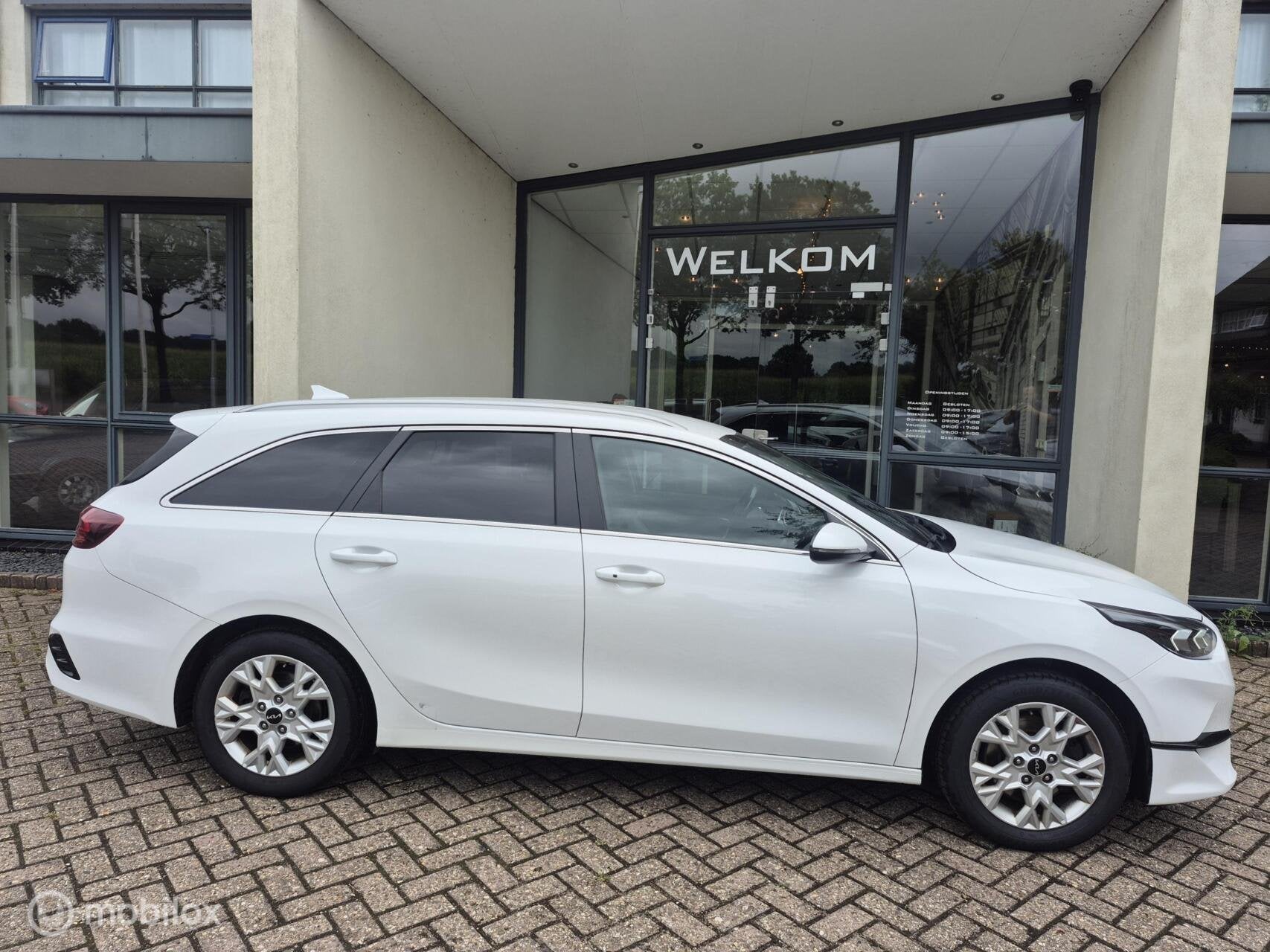 Kia Ceed Sportswagon 1.5 T-GDi PlusLine ✅Afn.Trk✅1e eig, Auto's, Kia, Voorwielaandrijving, Euro 6, Leder en Stof, Wit