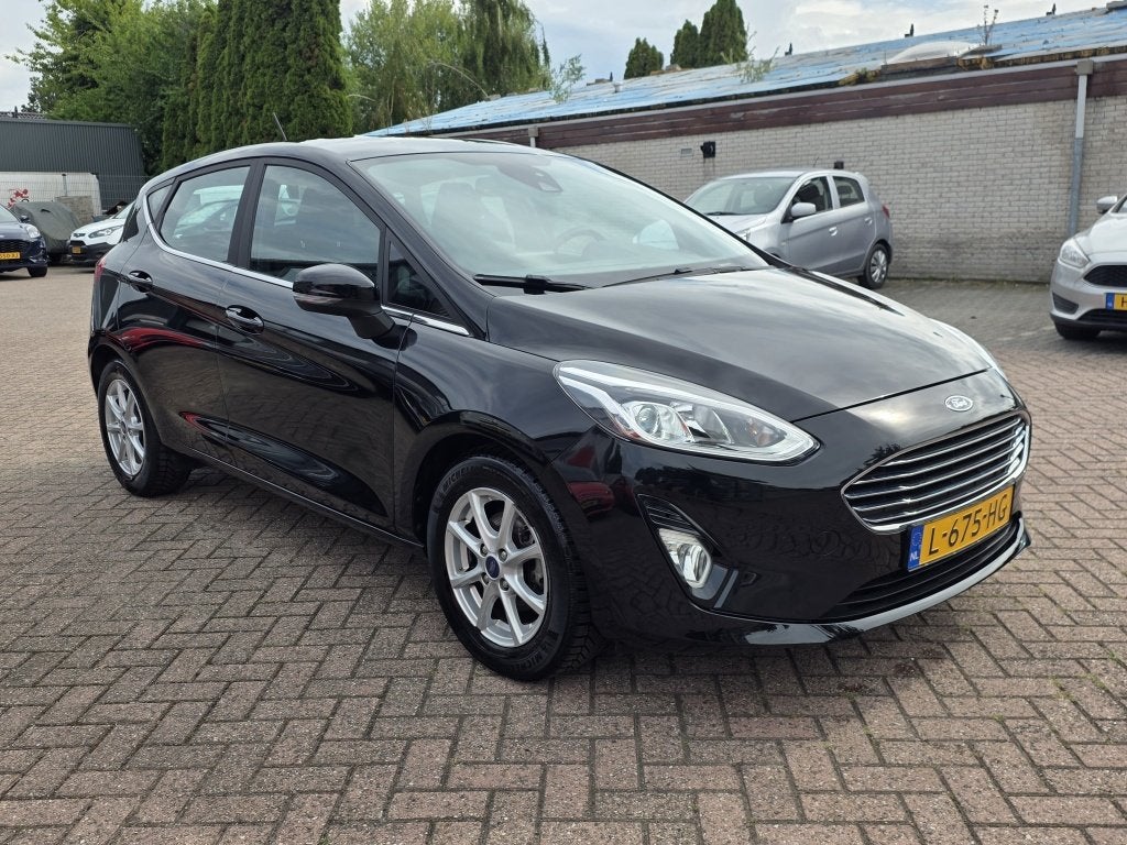 Ford Fiesta 1.0 EcoB. Titanium, keyless, navi, parkeersensor, Auto's, 94 pk, Stof, 580 kg, 1064 kg
