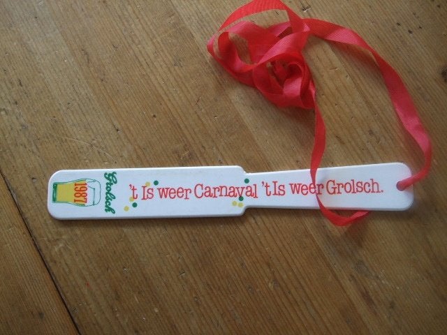 Grolsch spatel 1987 / afschuimer 't Is weer Carnaval......, Ophalen of Verzenden, Nieuw, Overige typen, Grolsch