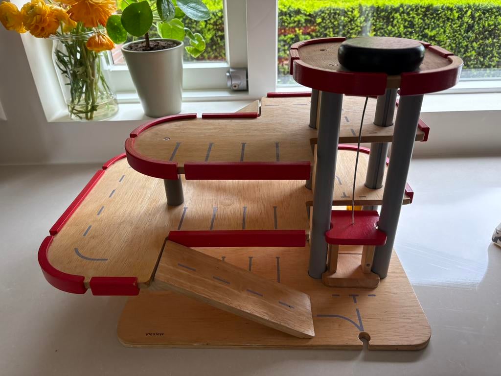 Plantoys autogarage, Ophalen, Zo goed als nieuw