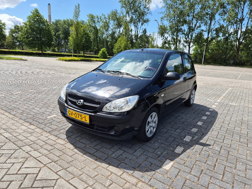 Hyundai Getz 1.1i ActiveVersion (2008) Airco - APK November, Auto's, Hyundai, Voorwielaandrijving, 63 pk, Zwart, 4 cilinders