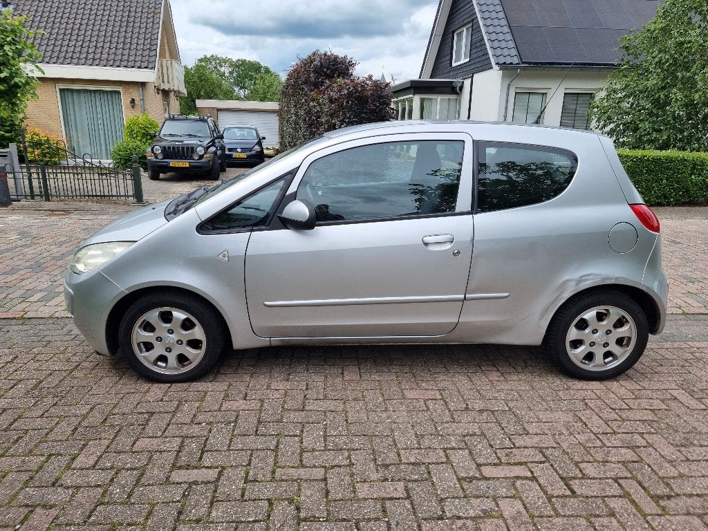 Mitsubishi Colt 1.3 Mivec CZ3, met lange APK en koude airco, Voorwielaandrijving, Stof, Colt, Origineel Nederlands
