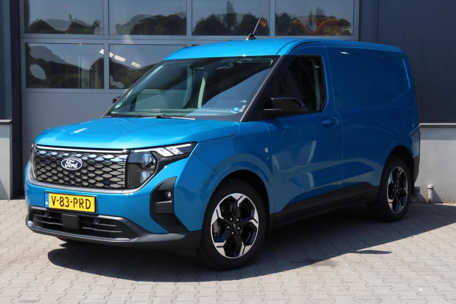 Ford E-Transit Cour. Limited 44 kWh l FULL OPTION l NAVI l C, Auto's, Dealer onderhouden, Gebruikt, Blauw, 44 kWh