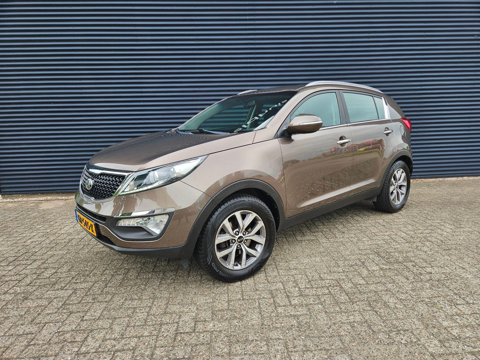 Kia Sportage - 1.6 BusinessLine | CRUISE | CAM | NAVI | PDC!, Auto's, Kia, Voorwielaandrijving, Euro 5, 4 cilinders, Bruin