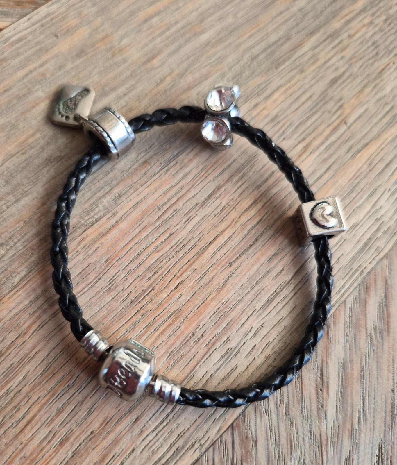 Heart Beads armband zwart met 3 bedels, Zwart, Ophalen of Verzenden, Zo goed als nieuw, Met bedels of kralen