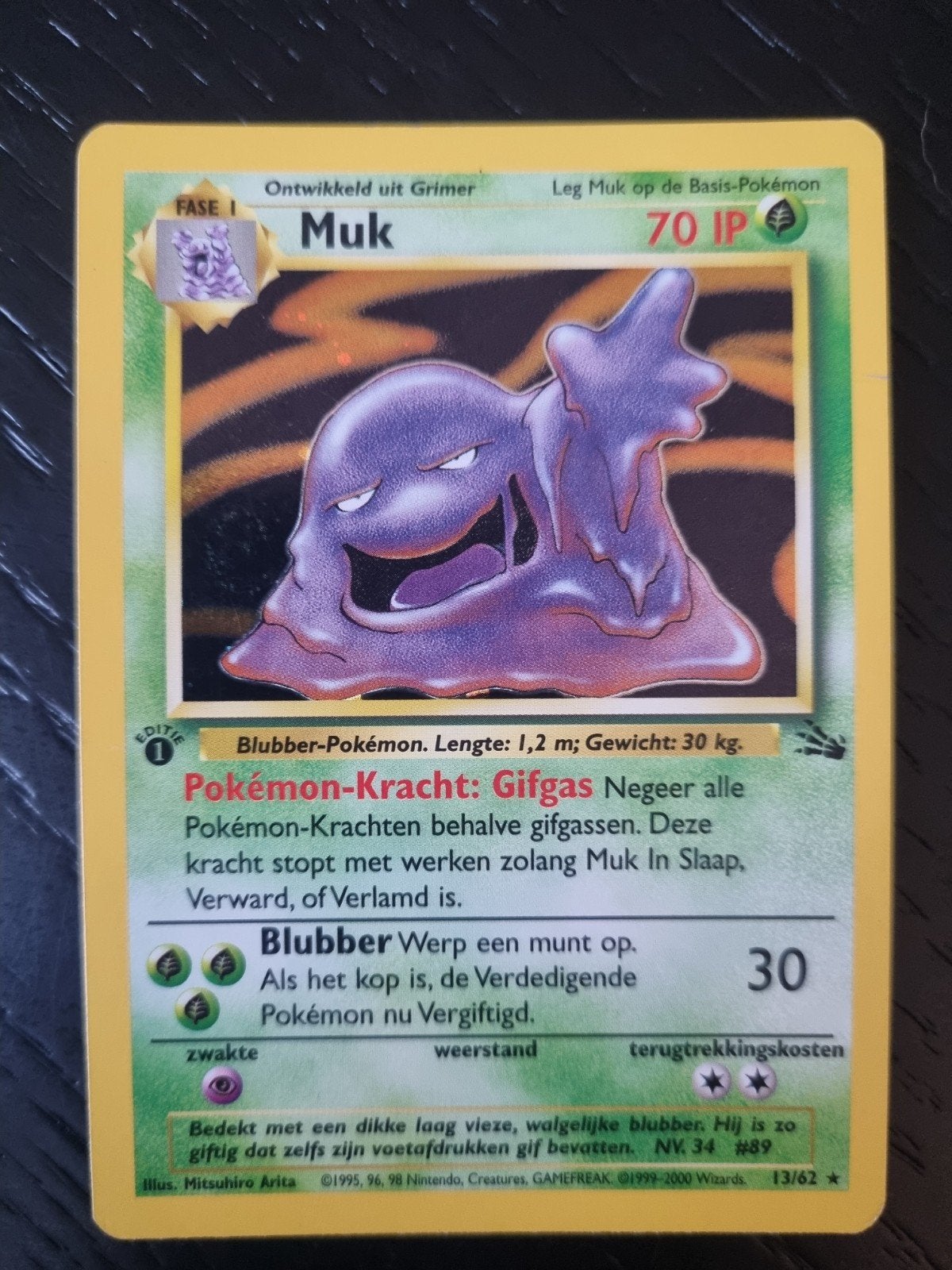 MUK 13/62 HOLO RARE * ! 1E EDITIE FOSSIL NL € 30, Ophalen of Verzenden, Gebruikt, Losse kaart, Foil