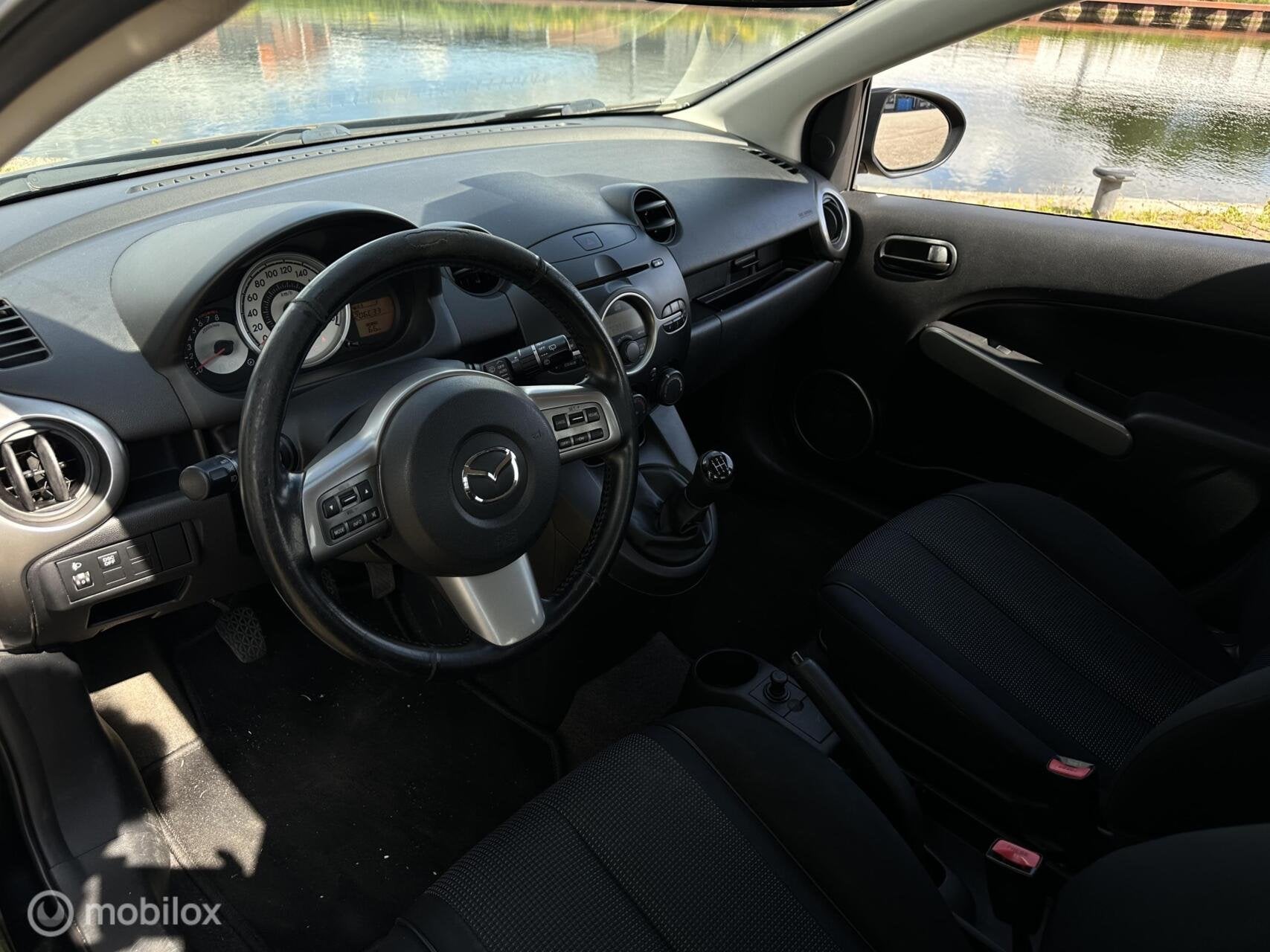 Mazda 2 1.5 GT-M| Climate | Cruise | Stoelverwarming, Auto's, Voorwielaandrijving, Stof, Zwart, 4 cilinders