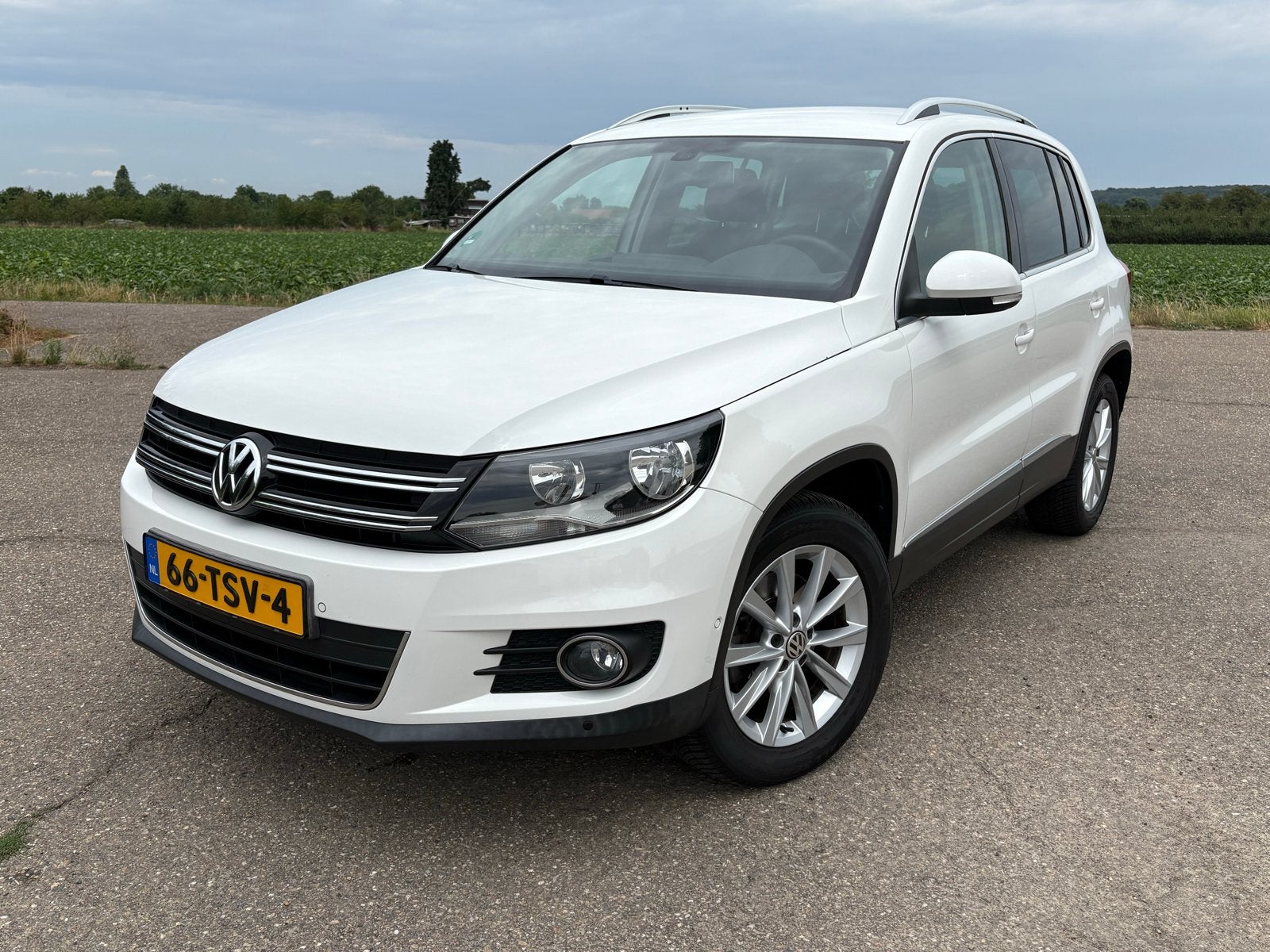 Volkswagen Tiguan 1.4Tsi sport&style, Auto's, Voorwielaandrijving, 15 km/l, 1800 kg, 4 cilinders
