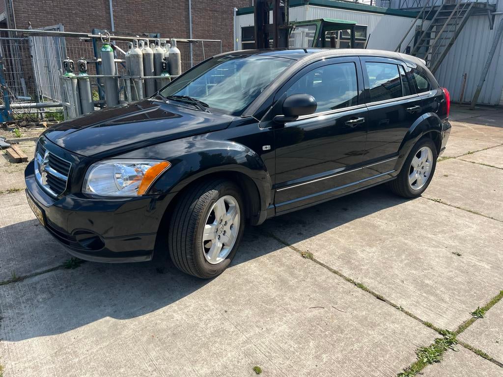 Dodge Caliber 1.8 2008 Zwart, Auto's, Dodge, Particulier, Caliber, Benzine, C, Hatchback, Handgeschakeld, Origineel Nederlands