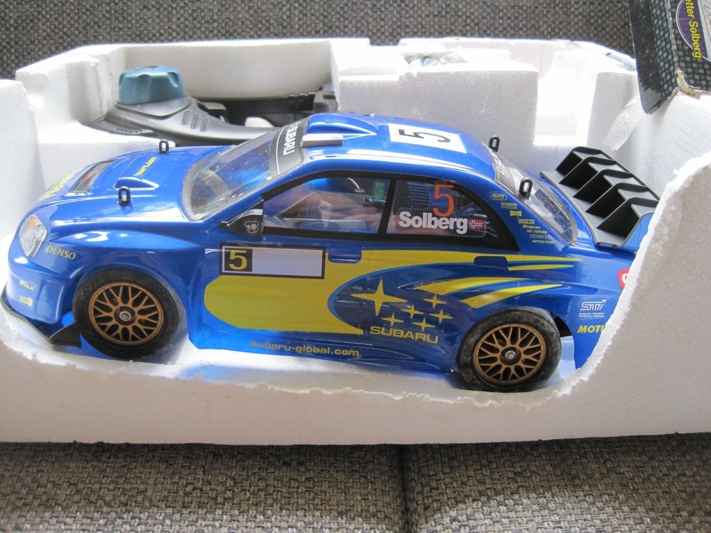 Nikko Subaru Impreza afstand bestuurbare auto, Elektro, Schaal 1:14, Nieuw, Ophalen of Verzenden