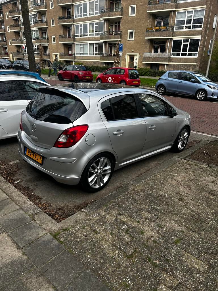 Opel Corsa 1.4 16V 5D WR 2010 Grijs, Auto's, Opel, Voorwielaandrijving, 1063 kg, 4 cilinders, 49 €/maand